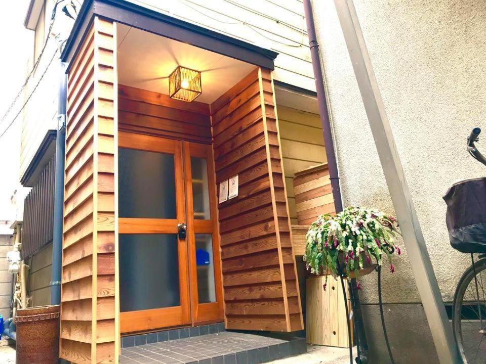 Appartamento Den 7 Tokyo Esterno foto